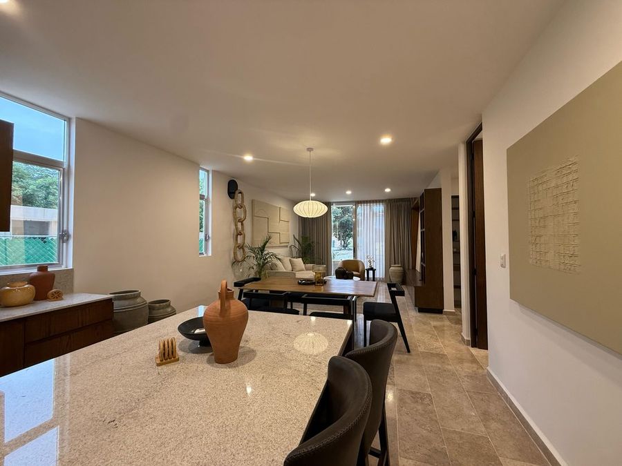 Cocina y comedor del departamento muestra